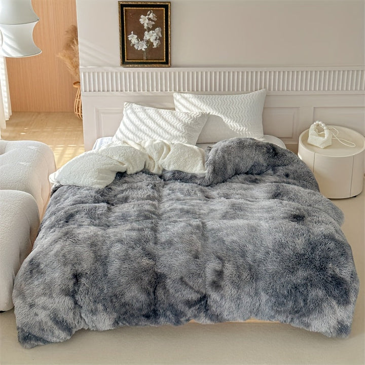 Plaid polaire chaud et doux, parfait pour des moments cocooning en hiver à la maison.