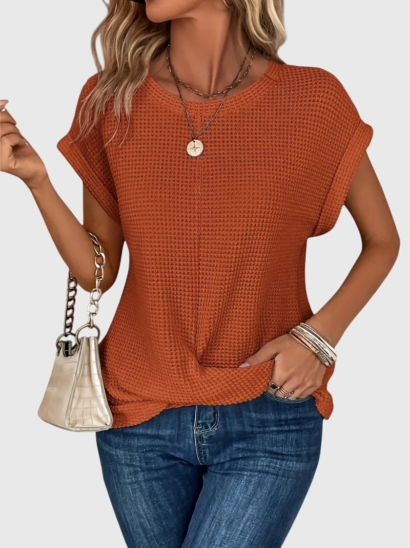 Blouse femme élégante à col rond, parfaite pour le bureau ou un look chic décontracté. Vêtement intemporel.