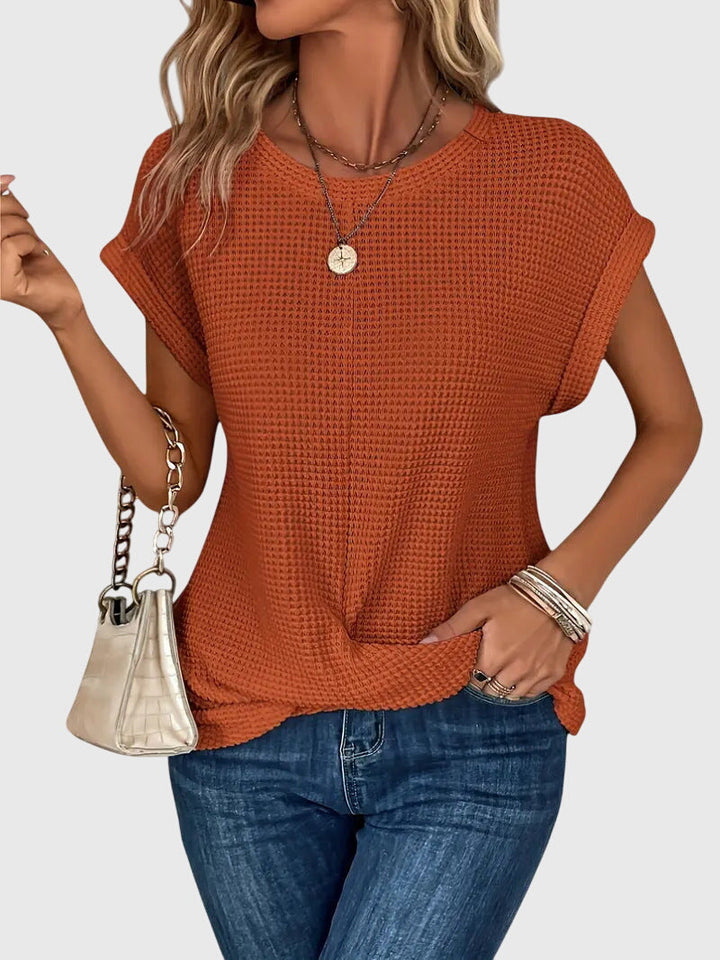 Blouse femme élégante à col rond, parfaite pour le bureau ou un look chic décontracté. Vêtement intemporel.
