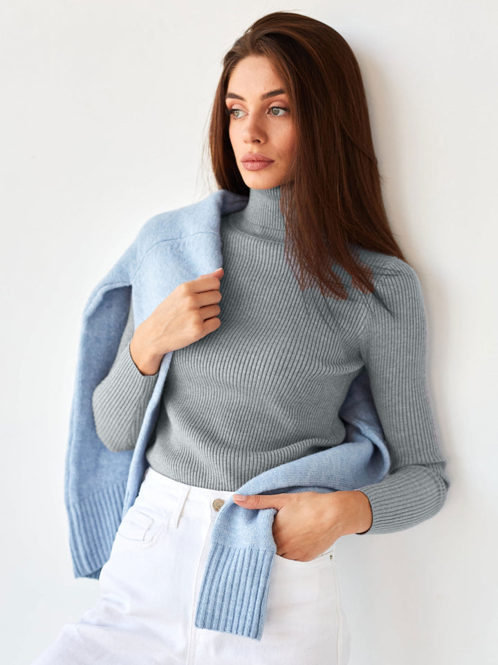 Tendance pull col roulé femme, coupe élégante. Manches longues, idéal pour l'automne et l'hiver.