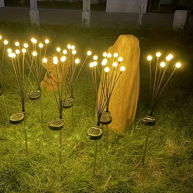 Lampe solaire LED lucioles pour jardin, créant une ambiance féerique. Éclairage extérieur écologique pour terrasse.