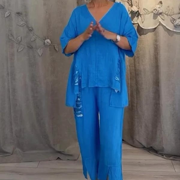 Tenue femme chic et décontractée 2 pièces: top à décolleté V élégant et pantalon fluide, parfait pour l'été.