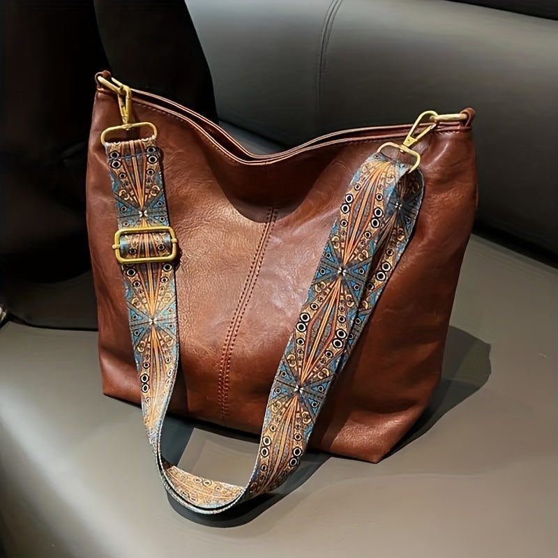 Sac femme quotidien rétro, motif géométrique, bandoulière confortable, espace généreux.