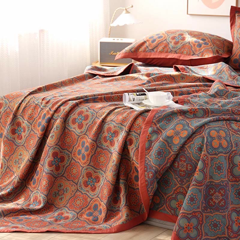 Gros plan sur le motif mandala détaillé de la couette réversible, idéale pour une décoration bohème chic.