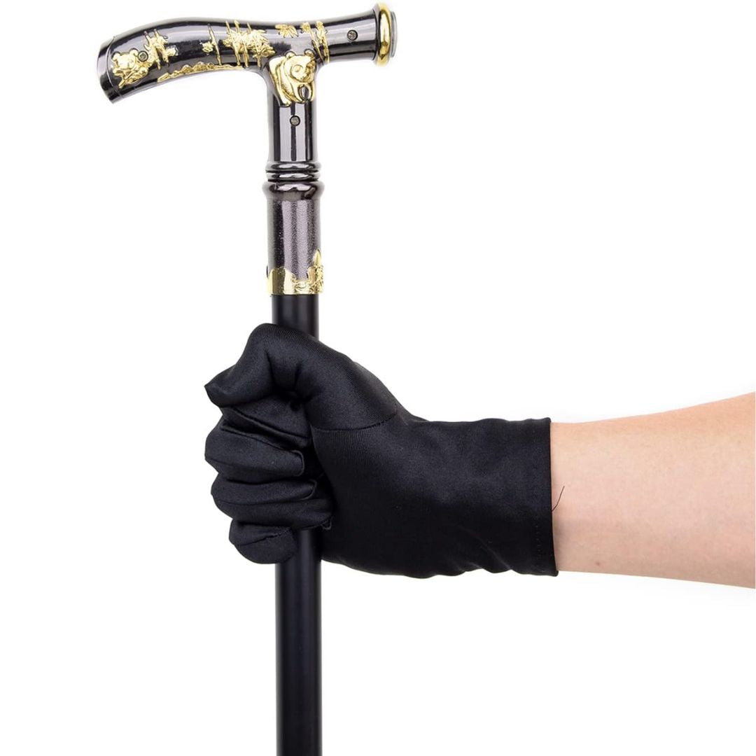 Canne élégante noire, poignée dorée sculptée, confort et stabilité. Aide à la mobilité pour seniors.
