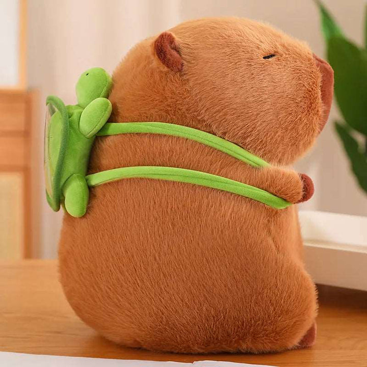 Capybara en peluche de qualité supérieure, doux et marron, avec un sac à dos tortue unique pour les enfants.