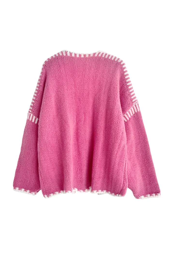 Cardigan femme doux, ample, à bordures contrastées et manches longues. Parfait pour une superposition élégante en automne.