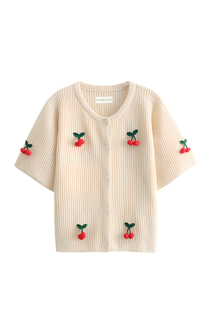 Cardigan chic à cerises pour femme, manches courtes. Pièce décontractée et élégante, idéale pour les tenues de jour.