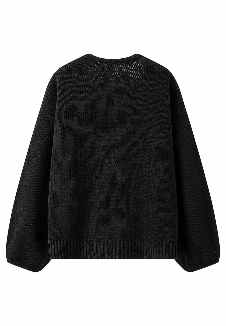 Cardigan femme festif, col en V, nœuds brillants. Vêtement élégant pour les fêtes ou soirées d'hiver.