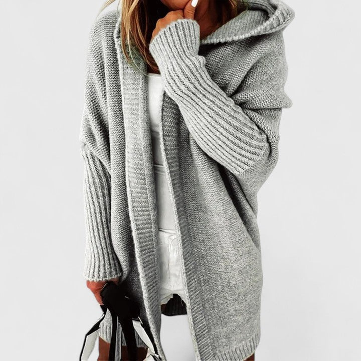 Cardigan gilet long oversize à capuche femme, idéal pour le confort et un style décontracté élégant.