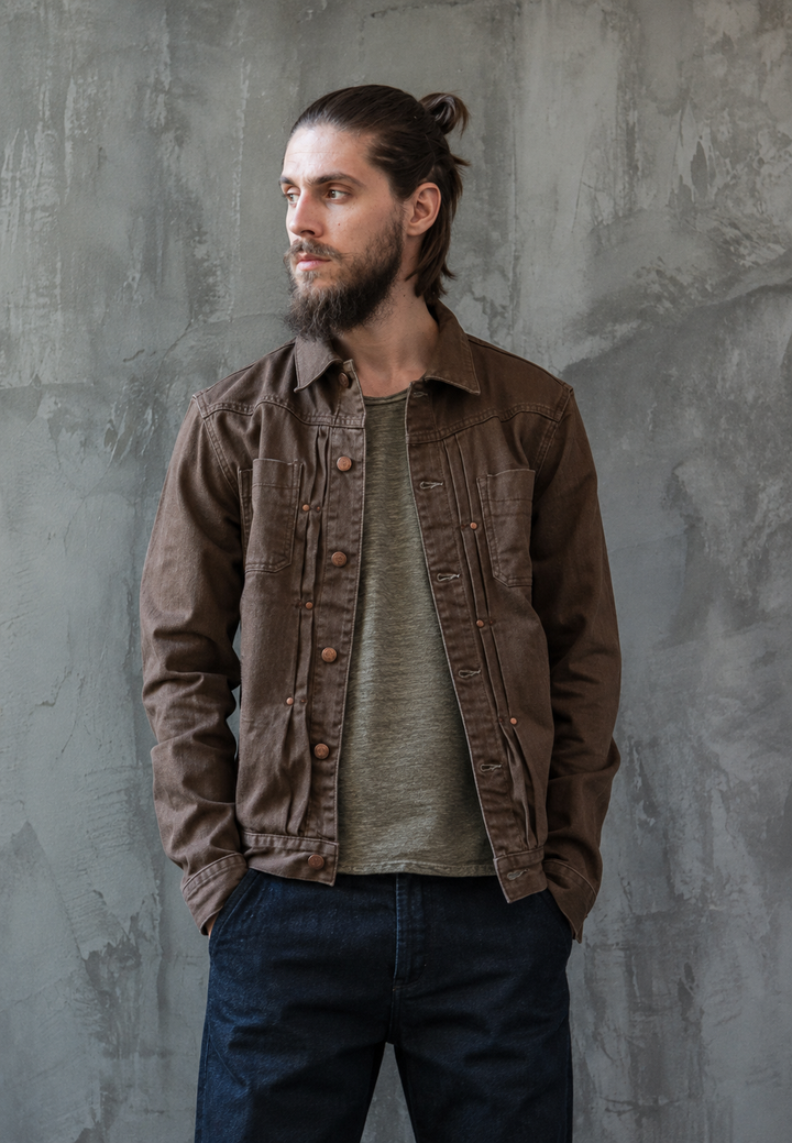 Veste homme de travail délavée, style vintage utilitaire. Parfaite pour mode masculine décontractée automne. Multi-poches.