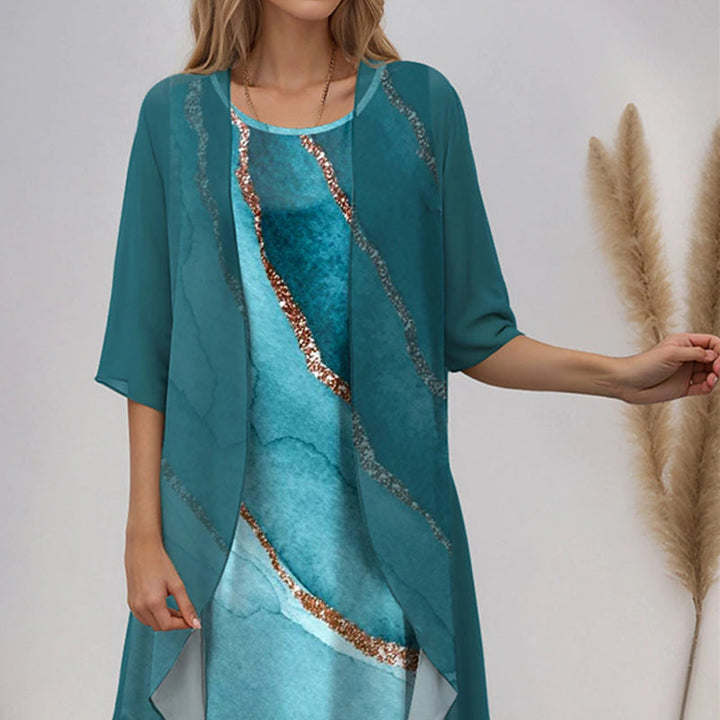 Robe femme fleurie midi, motif élégant, idéale pour l'été, style raffiné et mode féminine.