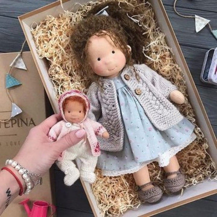 Marionnette à main pédagogique pour développer la motricité fine et l'apprentissage des enfants.
