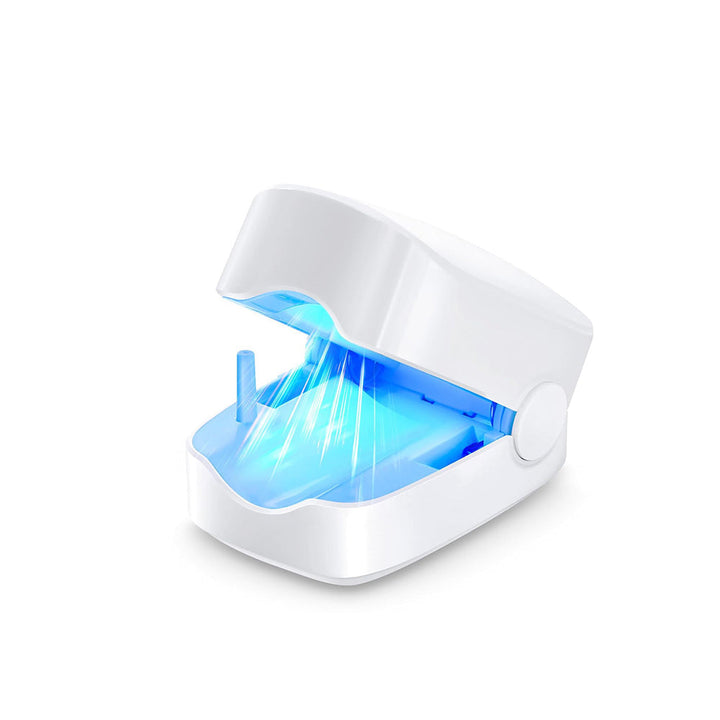 Appareil laser de soin des ongles pour traitement à domicile, favorise des mains impeccables.