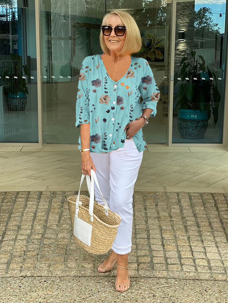 Blouse femme élégante à col V et imprimé floral, parfaite pour l'été. Style fleuri décontracté et confortable.