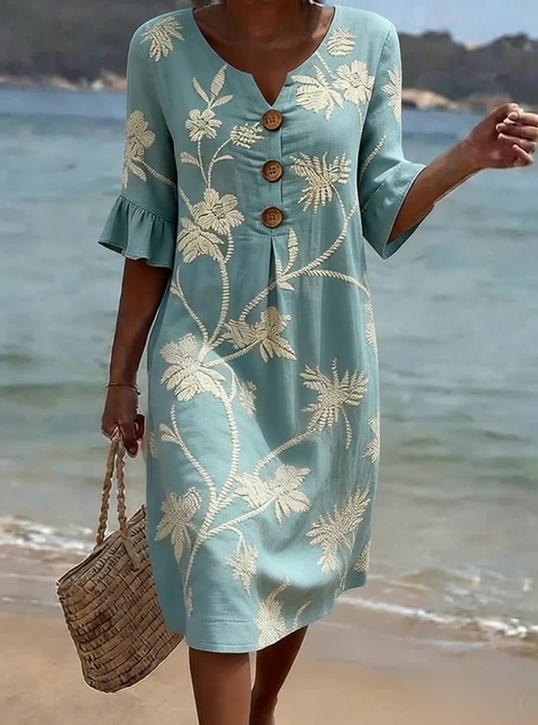 Robe fleurie femme élégante à manches volantées, idéale pour l'été, la plage et les vacances décontractées.