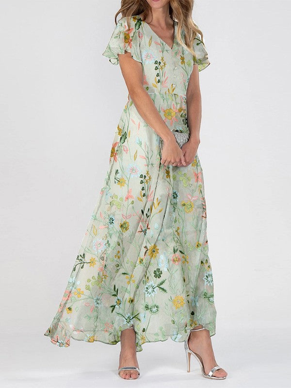 Robe longue femme fleurie élégante verte à col V, coupe fluide. Idéale pour l'été, soirée chic, mariage ou vacances.