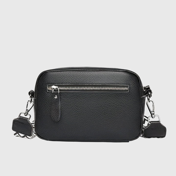 Sac à bandoulière en cuir beige pour femme, accessoire de mode chic et organisé, idéal pour le quotidien.