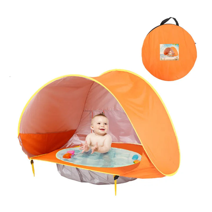 Tente de plage portable anti-UV pour enfants, idéale pour la protection solaire de bébé en extérieur. Équipement essentiel.