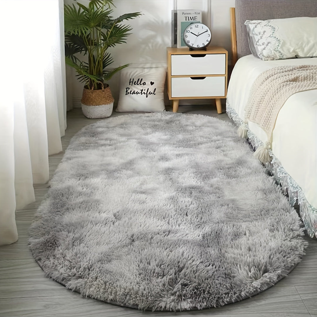 Grand tapis ovale doux et moelleux en polyester lavable pour le salon.