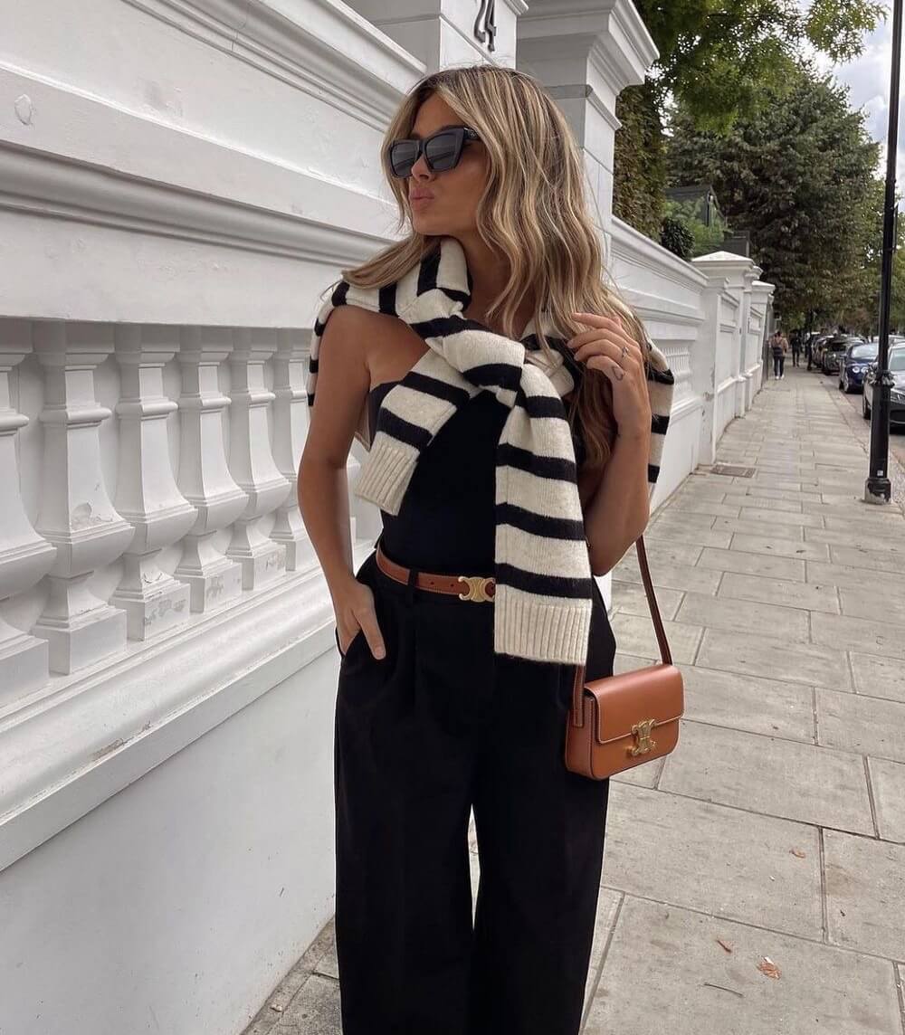 Ceinture pour femme présentée sur mannequin, montrant son ajustement parfait et sa boucle dorée élégante.