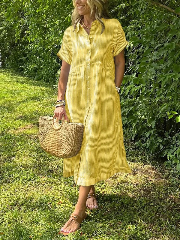 Belle robe d'été fluide pour femme, coupe maxi, col rond et boutons décoratifs, idéale pour un look décontracté chic.