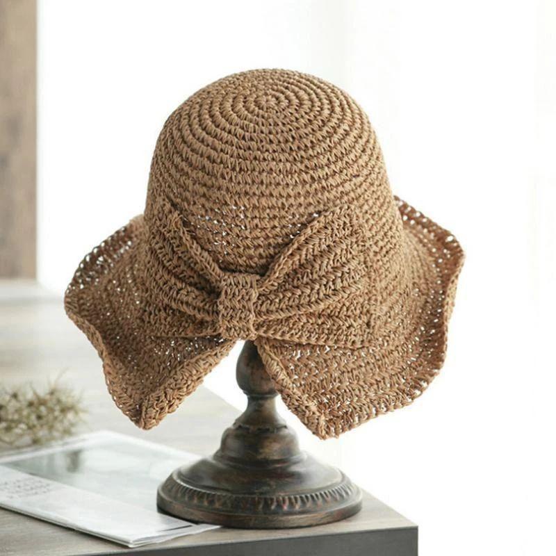 Chapeau d'été femme, grand bord protecteur. Nœud élégant, parfait pour le style estival et les vacances.