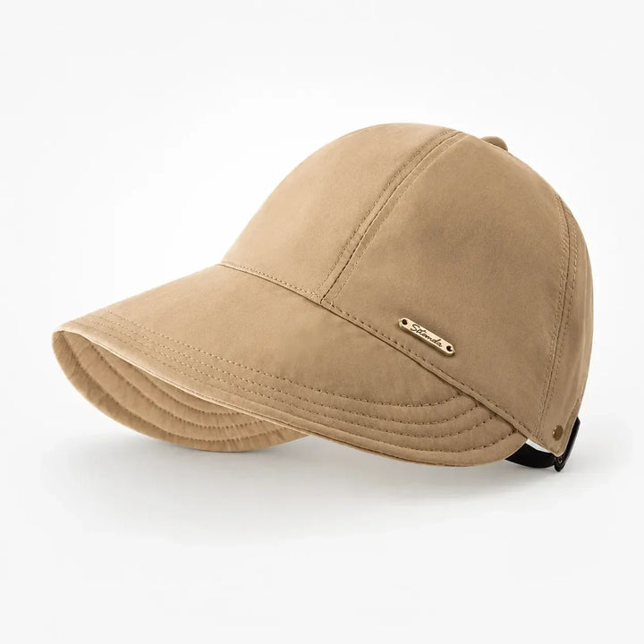 Chapeau de soleil élégant pour femme, protection UPF 50+, idéal plage et été.