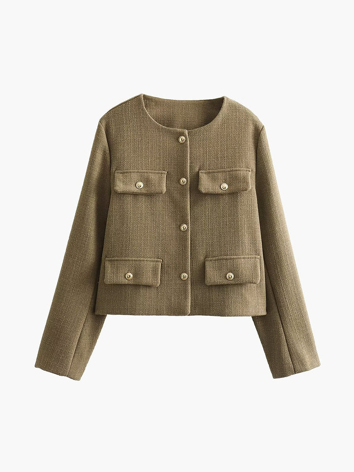Veste femme courte avec boutons dorés. Élégante et chic, parfaite pour compléter une tenue mode automne/printemps.