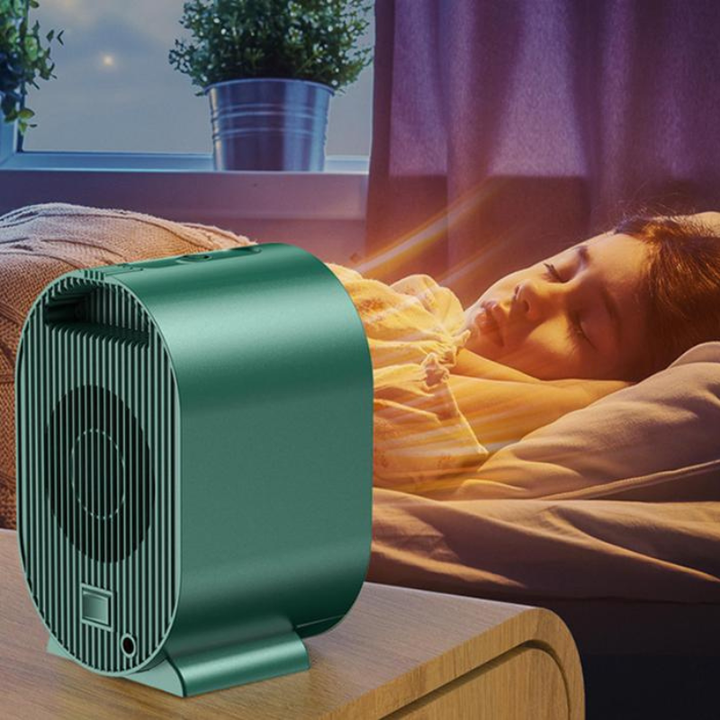 Chauffage électrique compact et portable, idéal pour le bureau, avec chaleur réglable en hiver.