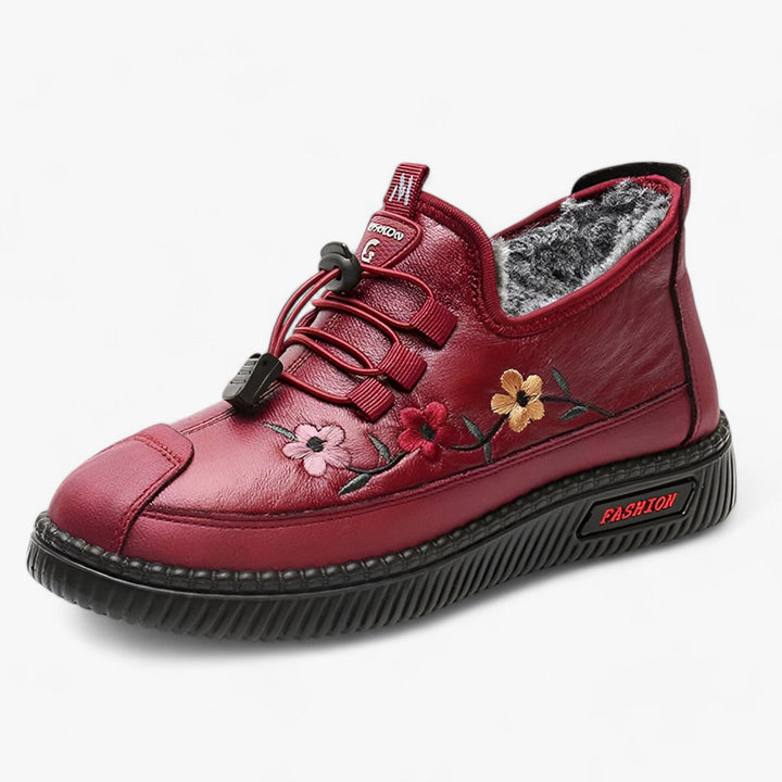 Pantoufles femmes confortables à imprimé fleuri rouge, idéales pour la maison et la détente.