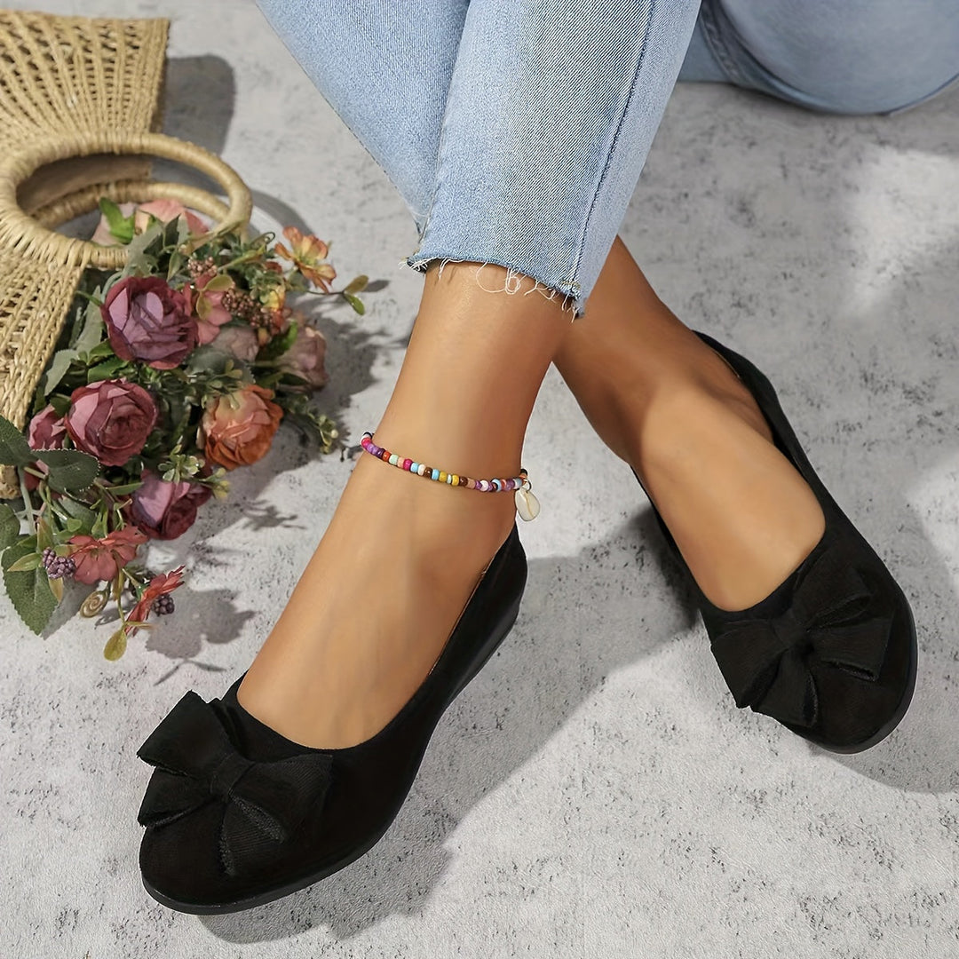 Ballerines quotidiennes femme noires, nœud chic, petit talon, soutien orthopédique longue durée.