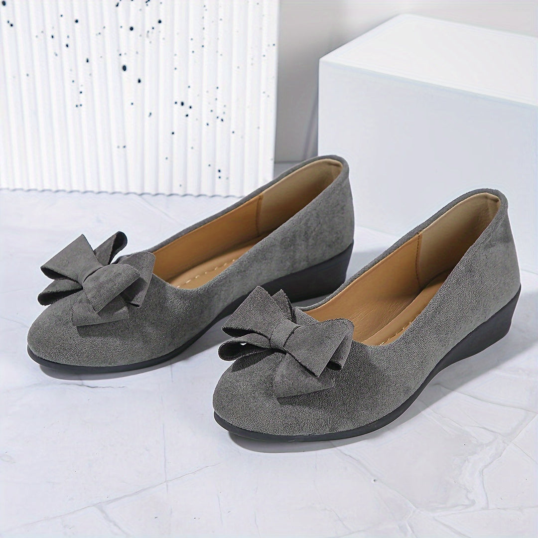 Ballerines confort rose pâle, petit talon, nœud élégant, soutien orthopédique pour femme.