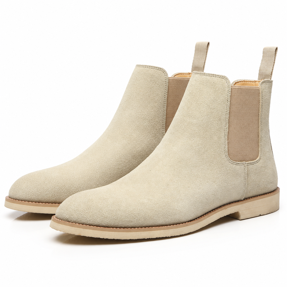 Bottines Chelsea homme en cuir marron, style mode masculine, faciles à enfiler pour l'automne-hiver.