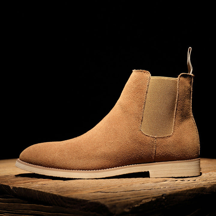 Dos des bottines Chelsea homme noires, montrant la sangle d'enfilage, pratique et stylée pour mode masculine.