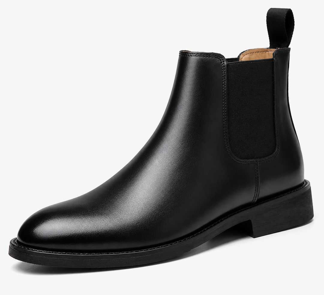 Paire de Chelsea boots homme noires, design classique et intemporel, chaussures élégantes et polyvalentes.
