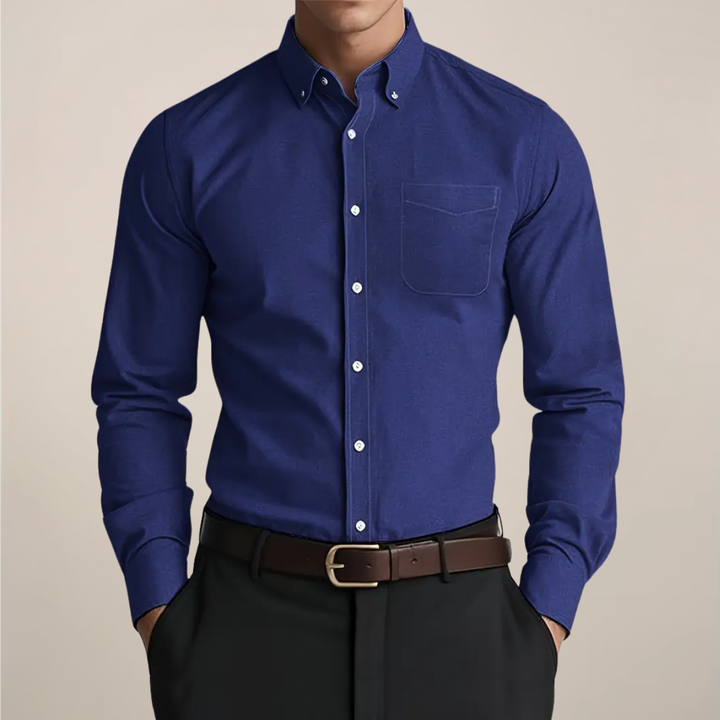 Chemise homme à manches longues, coupe moderne. Polyvalente pour tenue formelle ou décontractée. Confortable et chic.