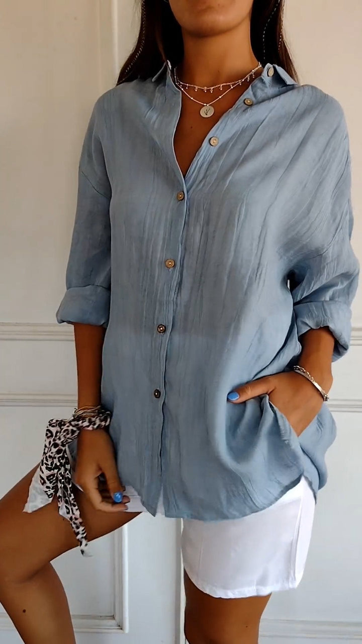 Chemisier femme plissé, coupe droite, confortable, idéal pour tenue décontractée ou habillée.