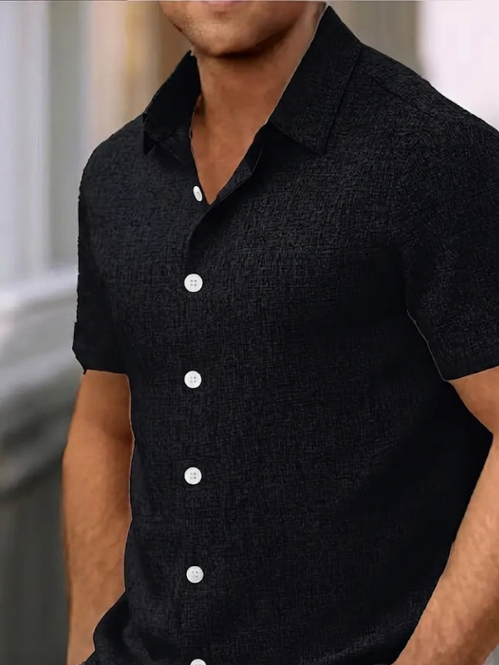 Chemise homme élégante et décontractée, manches courtes, idéale pour les journées d'été et les loisirs.