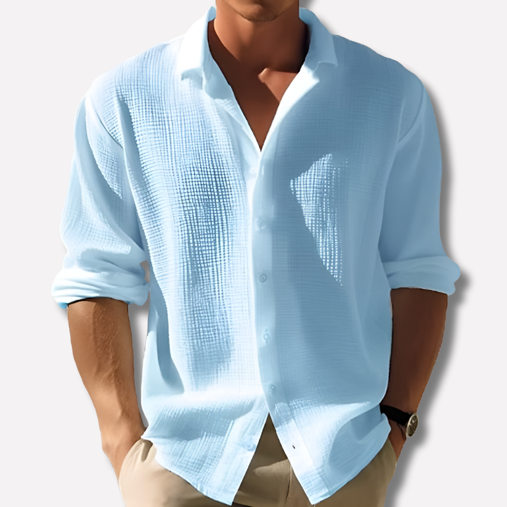 Chemise homme texturée blanche à col officier, boutonnée, manches longues pour un look décontracté moderne.