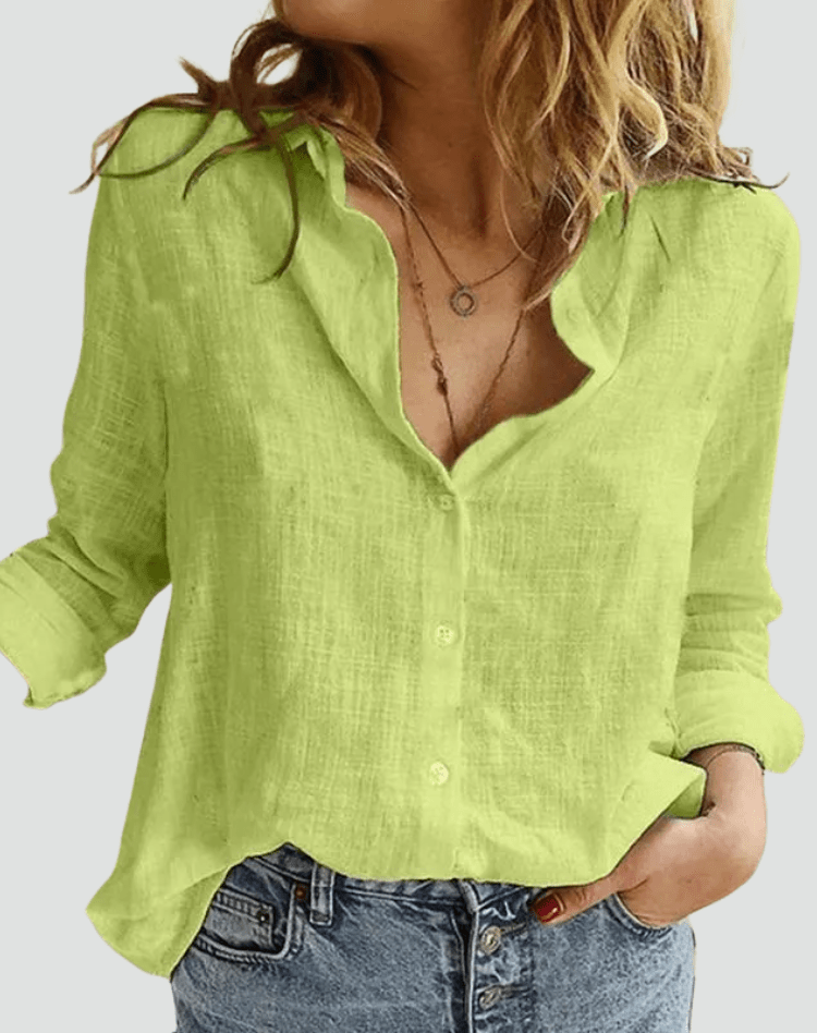 Chemise femme chic décontractée, manches longues fluides, coupe ample et élégante, style polyvalent moderne.