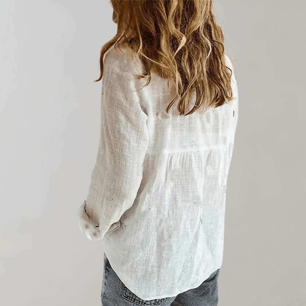 Haut femme élégant, chemise décontractée à col V et coupe ample, manches longues, style fluide.