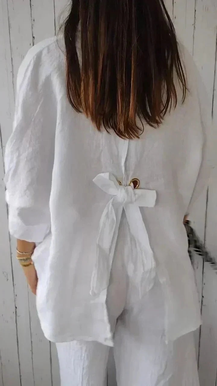Haut femme élégant et décontracté, chemise fluide pour style quotidien chic.