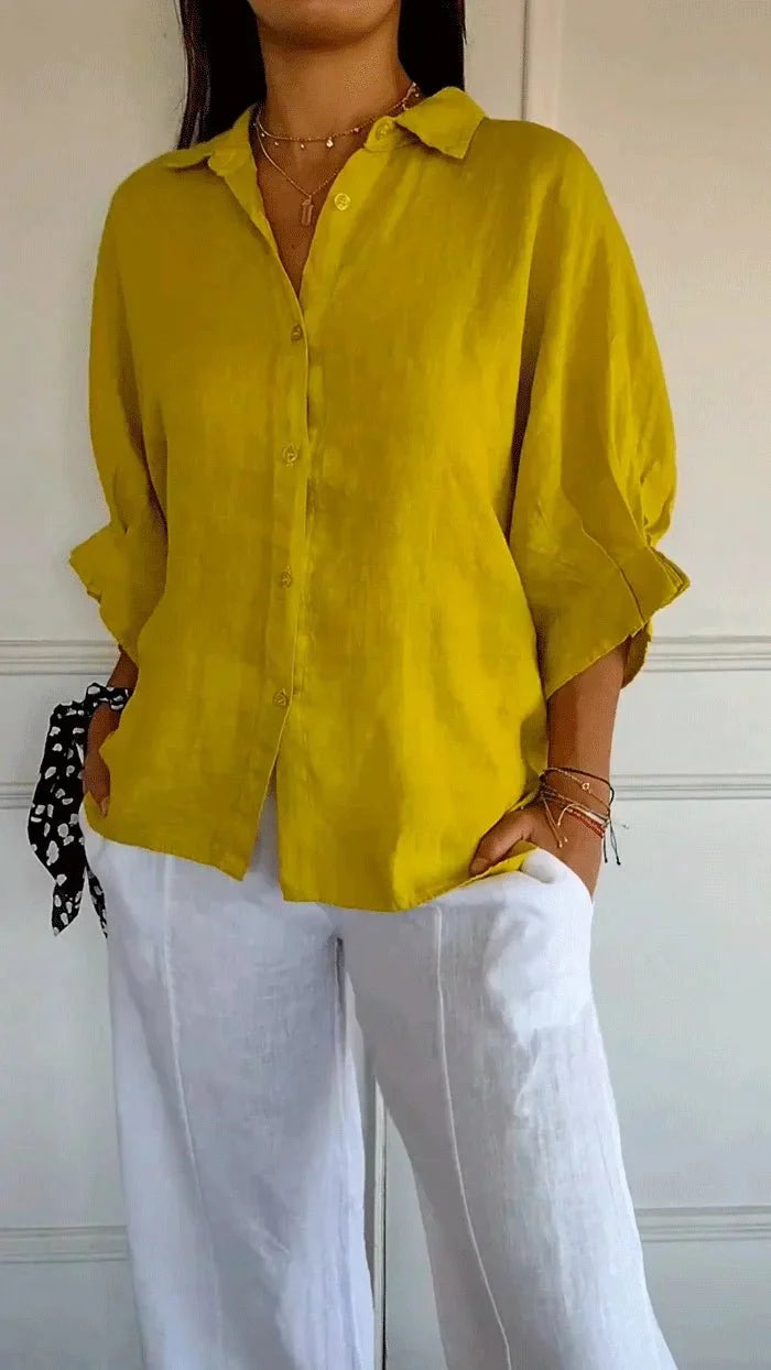 Haut femme décontracté-chic, chemise fluide et ample, style polyvalent quotidien.