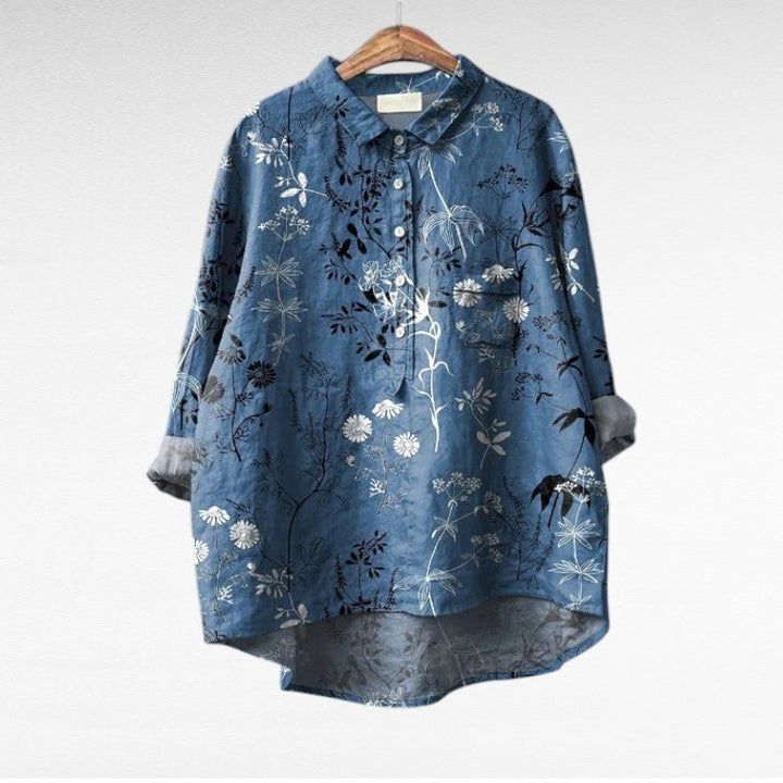 Chemise boutonnée femme à imprimé floral, longue et élégante, parfaite pour un look décontracté chic.