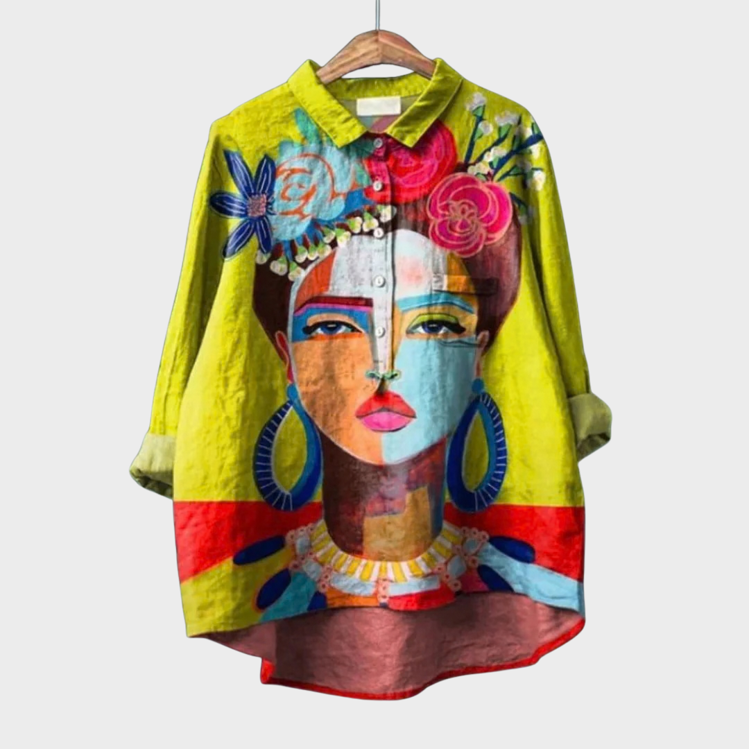 Chemise longue fluide imprimée pour femme, élégante et décontractée, idéale printemps-été avec manches retroussables.