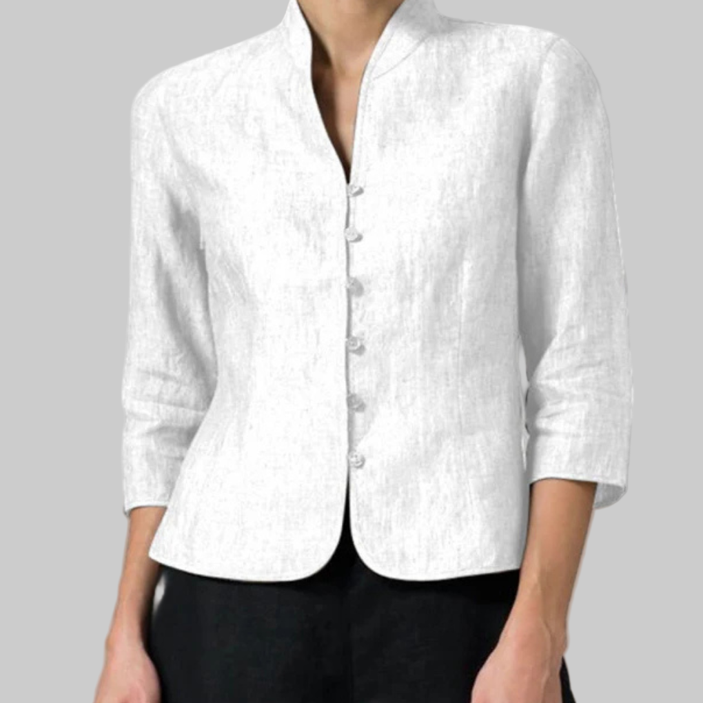 Blouse femme à col montant, manches 3/4. Confortable et élégante pour le bureau ou une sortie.