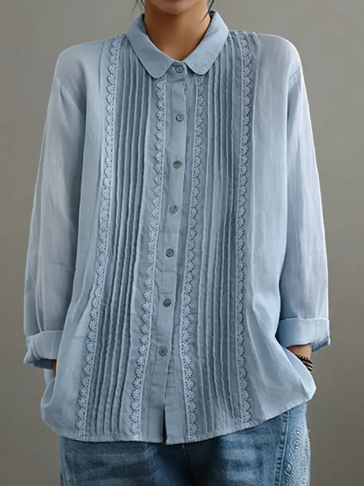 Blouse plissée femme confortable à manches longues, parfaite pour un style décontracté chic.