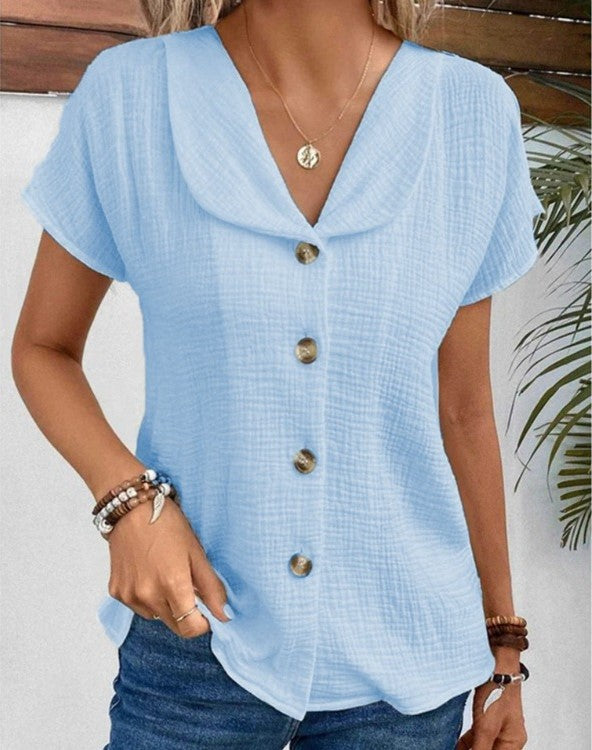 Blouse femme élégante col Claudine, texture fine, idéale pour la mode printemps/été.