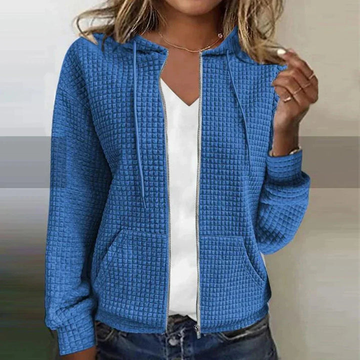 Haut femme zippé à capuche, sweatshirt confortable pour le quotidien ou les loisirs. Vêtement décontracté mode.